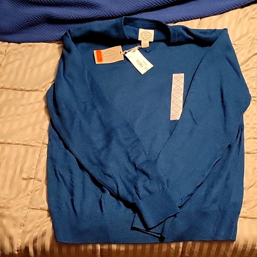 Never worn, with tags.  St. John's Bay V-neck sweater.